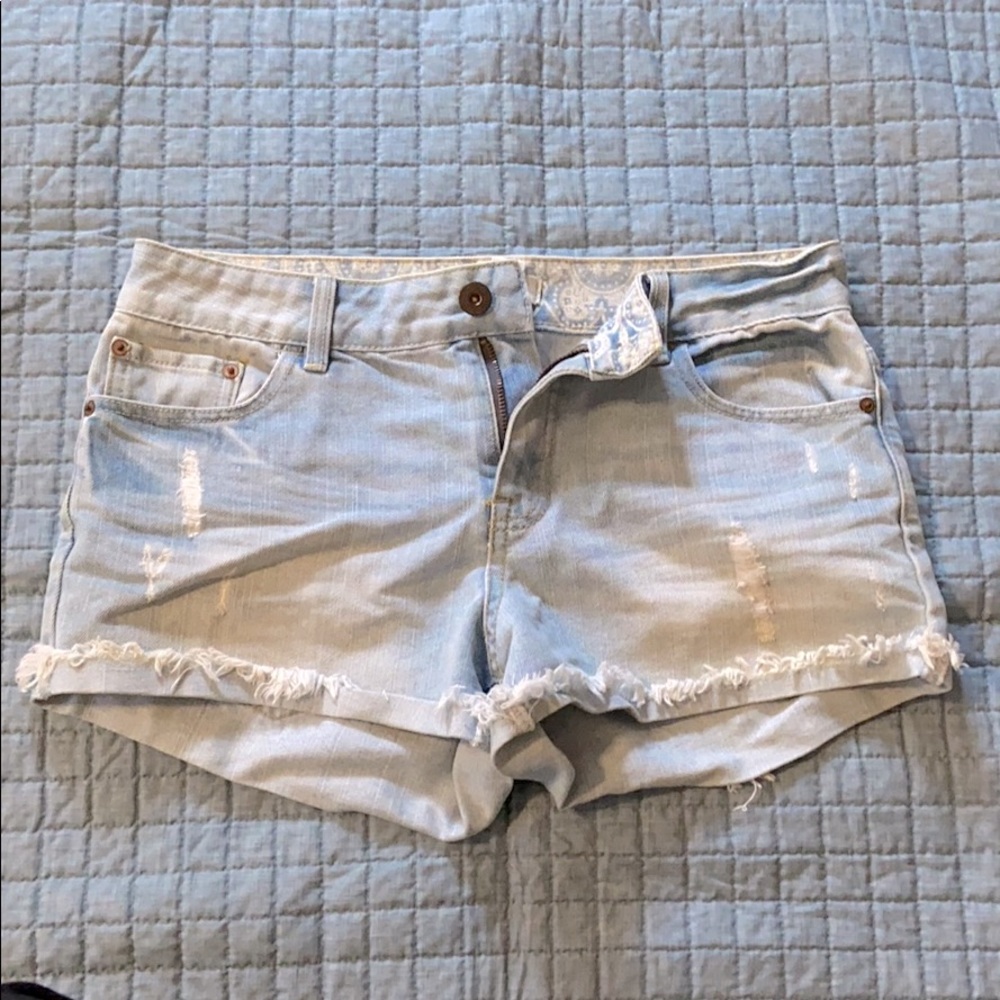 High rise distressed denim shorts